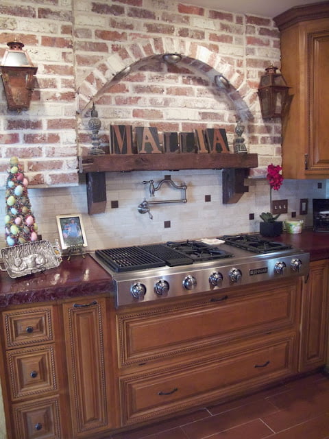 New Orleans inspired brick alcove and stove