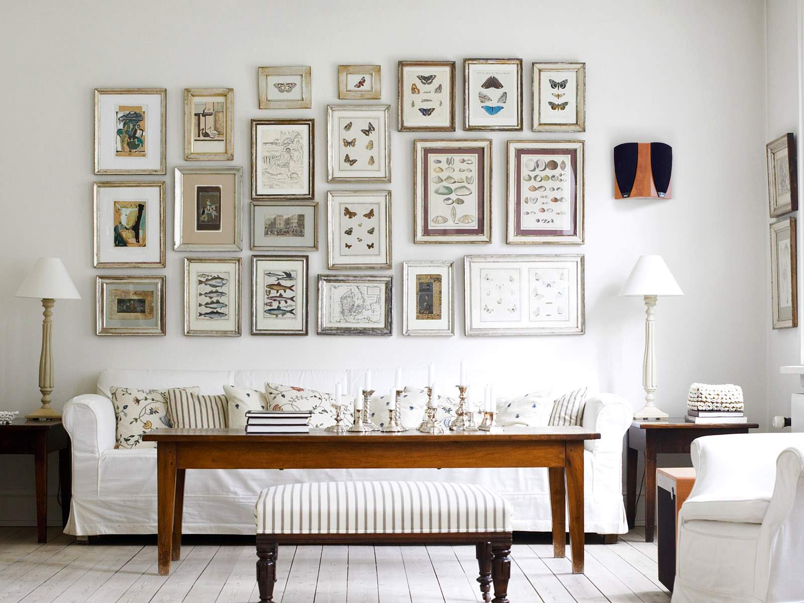 numerous-pictures-on-white-wall