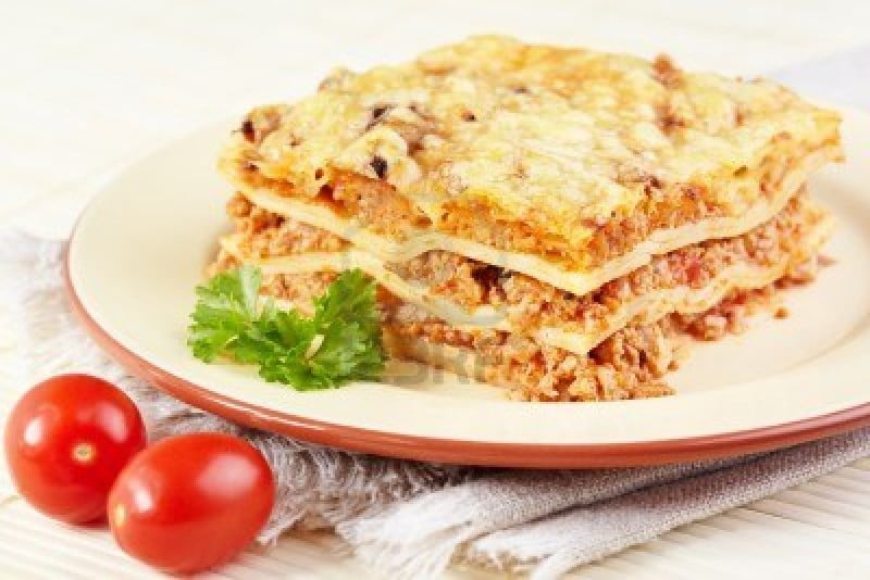 13543793-italian-cuisine-meat-lasagna-on-the-served-table1