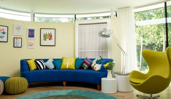 A-curved-blue-sofa-in-a-contemporary-living-room