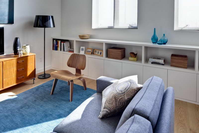Brown-And-Blue-Living-Room-With-Bookshelves