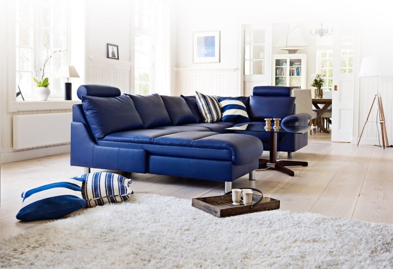 living-room-exciting-ideas-for-living-room-decoration-with-light-blue-stripe-floor-cushion-including-dark-blue-leather-modular-sofa-and-white-rug-in-living-room-contemporary-living-room-decorat