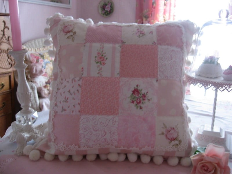 Patchwork rose pillow with pompoms 001